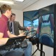 Mike Cullen takes students through simulator test