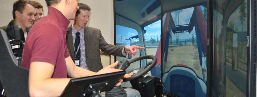 Mike Cullen takes students through simulator test