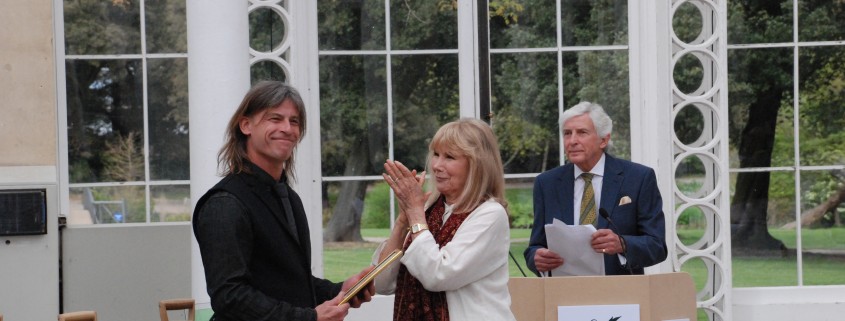 Daniel receives his certificate from actress Susan Hampshire