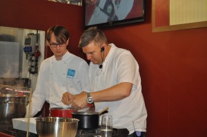 Matt Salt assists Peter Sidwell on the Cathedral City stand 