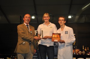 Reaseheath Principal Meredydd David presents the Student Cheesemaker award to Sarah Hinchliffe and Sam Clarke
