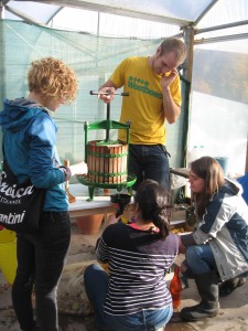 Our horticulture students  demonstrating apple pressing