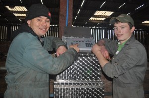 Chris Webb and Larry Anscombe with their automatic calf feeder