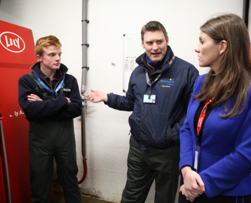 Farm Manager Ed Parrish, Principal Marcus Clinton, MP Edward Timpson CBE and Minister of State for Higher & Further Education Michelle Donelan at Reaseheath’s robotic milking parlour and data hub
