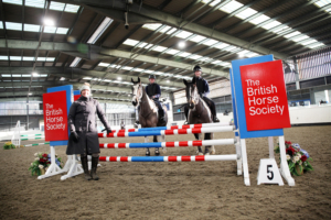 Students Nia Rosser and Sam Burns with FBHS Lead Assessor Sam York