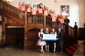 RAG cheque handover BHF's Hayley Gough, RAG Chair Sophie Connor, Senior Assistant Principal Paul Spearritt, SA President Steph Frazer