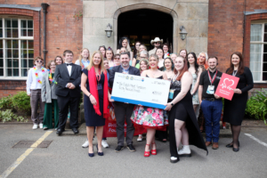 Students present their cheque to the British Heart Foundation