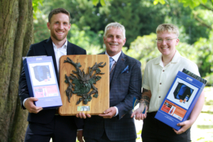 Forestry and Arboriculture students Jon Bowden, winner of the Rob Rowlinson Award for the Best Overall Student, and Jess Wilson, winner of the Award for Endeavour and Progress, with lecturer Alan Mottram (centre).