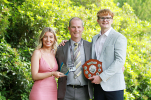 13. Design, Surveying and Planning for Construction students Phillipa Jones, who received the Together Award for Winner of the Together Bungalow Design and Harvey Bennett, winner of The Pochin Award for Best Work Experience Student Sponsored by Together, with Lecturer Phillip Greer.